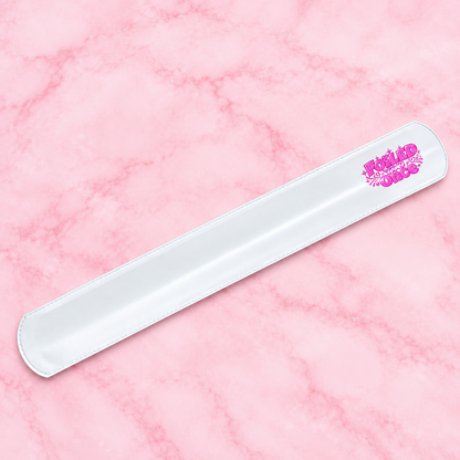 White Foiled You Once branded snap band on a pink marble background